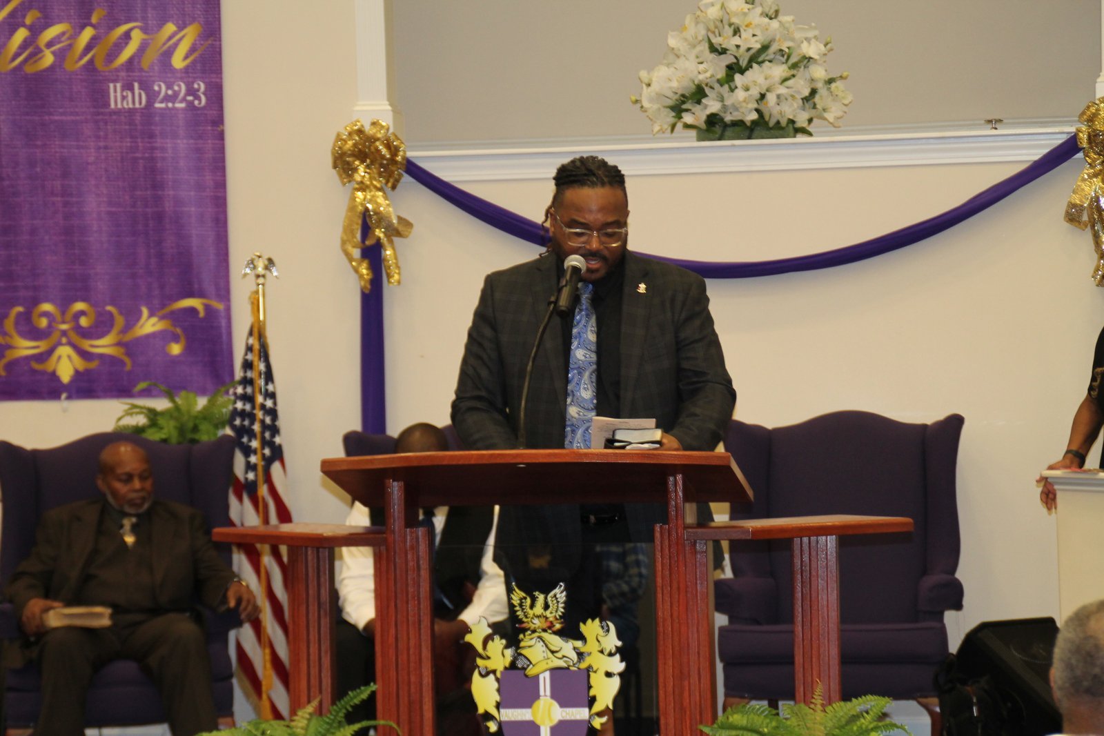 Minister speaking from the Vaughn's Chapel pulpit